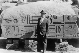 James Henry Breasted, archaeologist and director of the University of Chicago Oriental Institute (1901-1935). Dr. Breasted is at the great temple complex of Karnak in Egypt. Courtesy of 	University of Chicago Library, Special Collections Research Center, [apf1-02230].